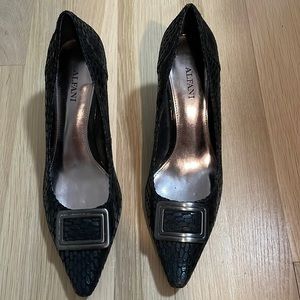 Like new black leather heels with buckle and pattern